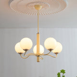 Modern Creamy Yellow Globe Glass Chandelier with White Spherical Shades
