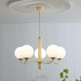 Modern Creamy Yellow Globe Glass Chandelier with White Spherical Shades