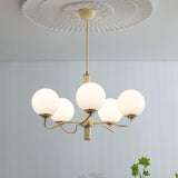 Modern Creamy Yellow Globe Glass Chandelier with White Spherical Shades