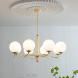 Modern Creamy Yellow Globe Glass Chandelier with White Spherical Shades