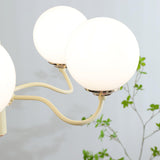 Modern Creamy Yellow Globe Glass Chandelier with White Spherical Shades