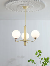 Modern Creamy Yellow Globe Glass Chandelier with White Spherical Shades