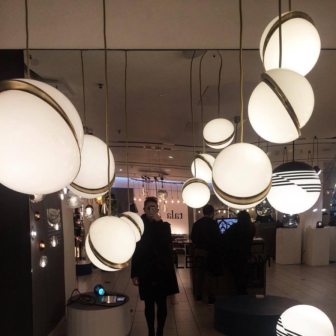 Modern Crescent Brass Pendant Light with Opal Globe Shade and Brushed Fascia
