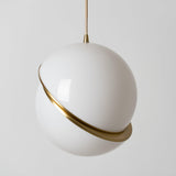 Modern Crescent Brass Pendant Light with Opal Globe Shade and Brushed Fascia