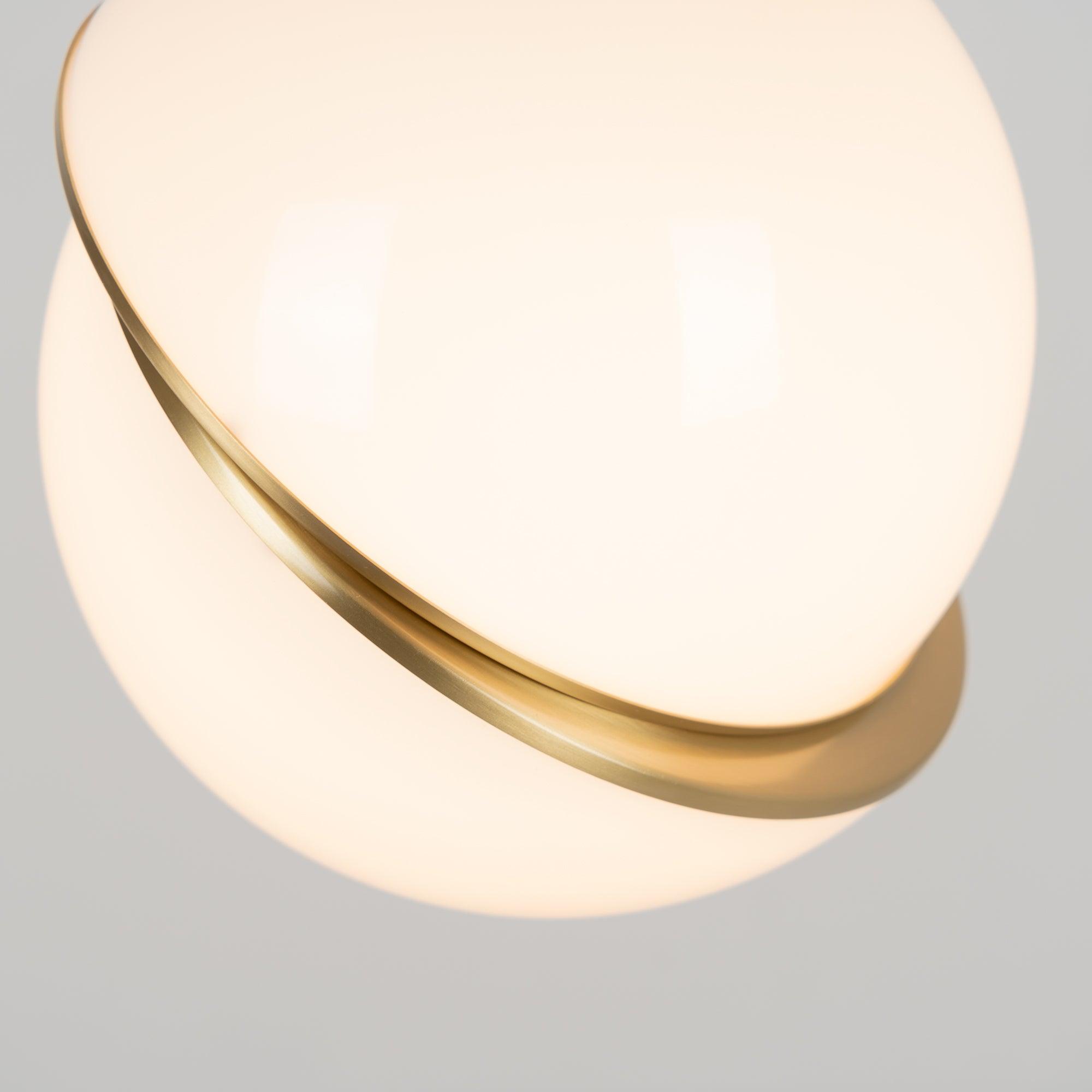 Modern Crescent Brass Pendant Light with Opal Globe Shade and Brushed Fascia
