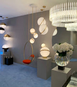 Modern Crescent Brass Pendant Light with Opal Globe Shade and Brushed Fascia
