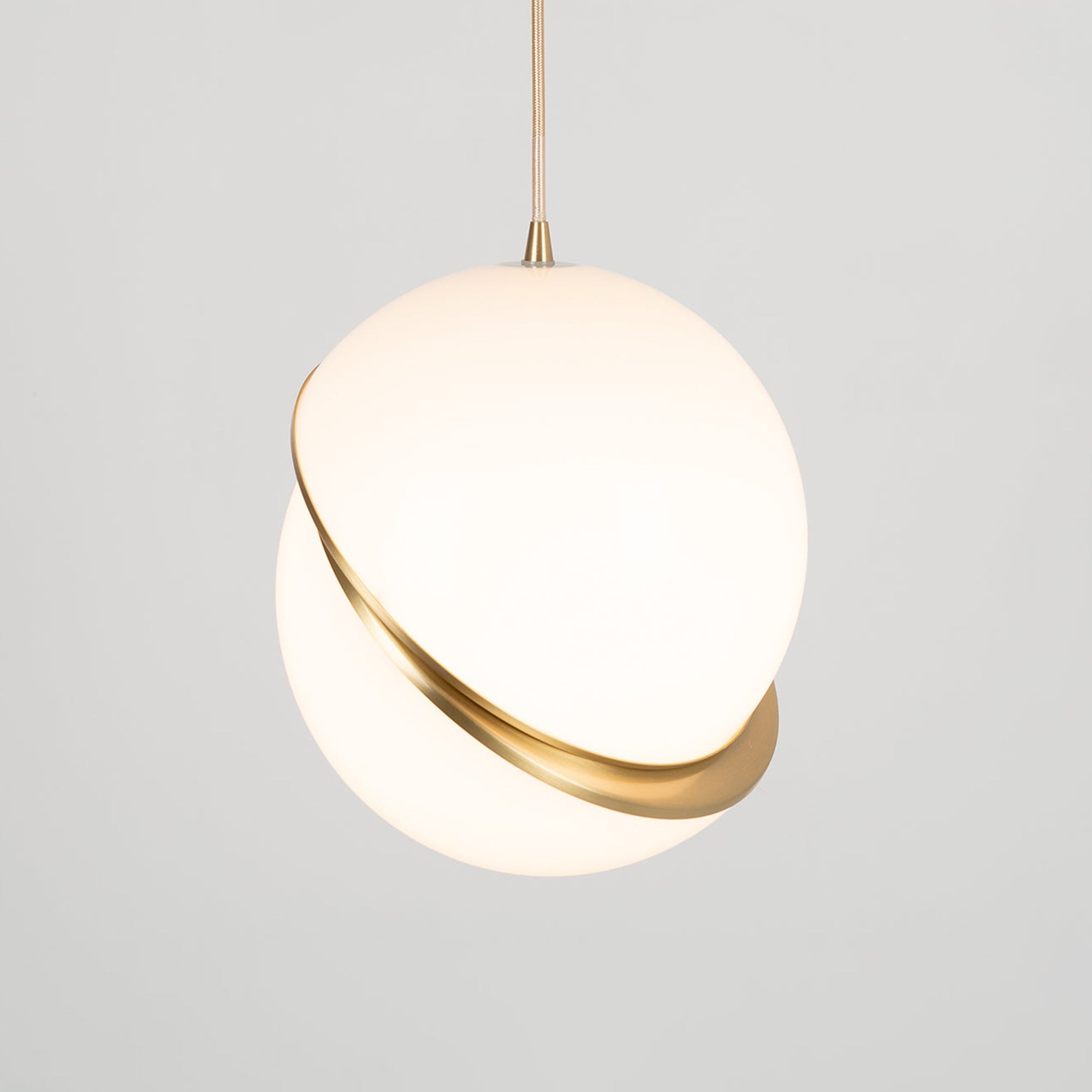 Modern Crescent Brass Pendant Light with Opal Globe Shade and Brushed Fascia