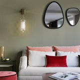modern-cylinder-glass-wall-sconce-with-perforated-metal-cage-and-steel-accents-for-home-decor