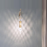 modern-cylinder-glass-wall-sconce-with-perforated-metal-cage-and-steel-accents-for-home-decor