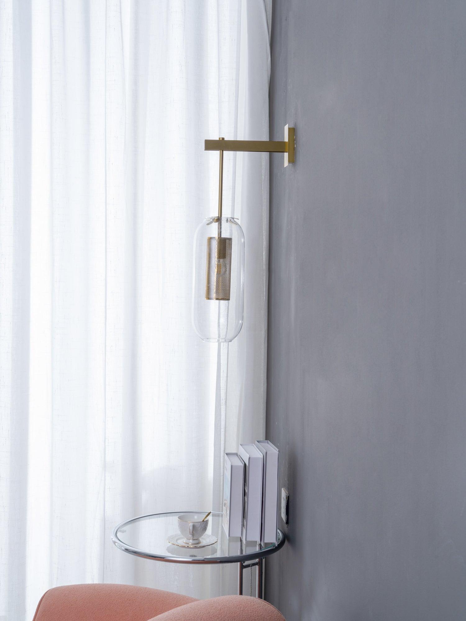 modern-cylinder-glass-wall-sconce-with-perforated-metal-cage-and-steel-accents-for-home-decor