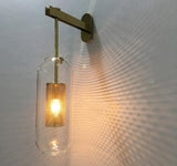modern-cylinder-glass-wall-sconce-with-perforated-metal-cage-and-steel-accents-for-home-decor