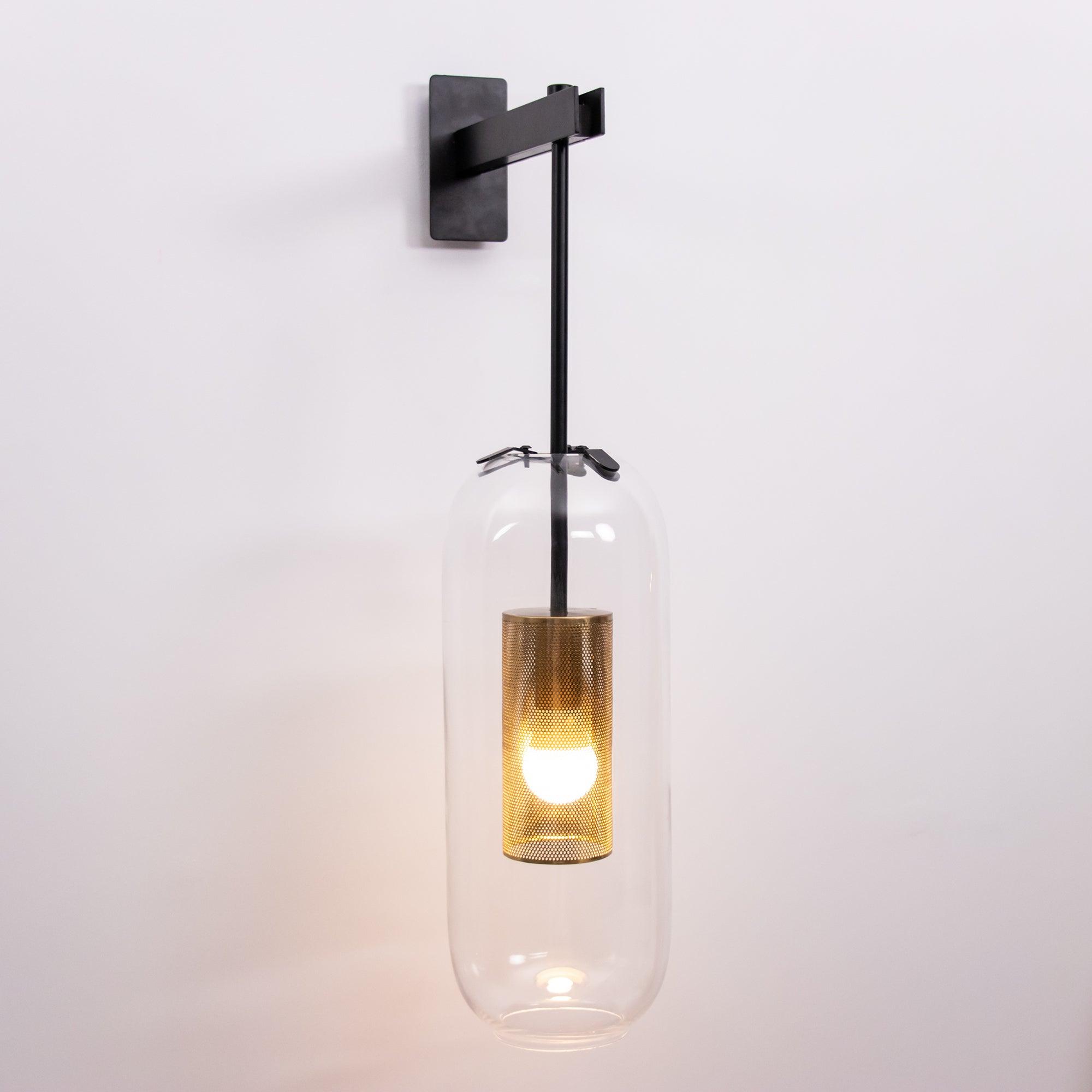 modern-cylinder-glass-wall-sconce-with-perforated-metal-cage-and-steel-accents-for-home-decor