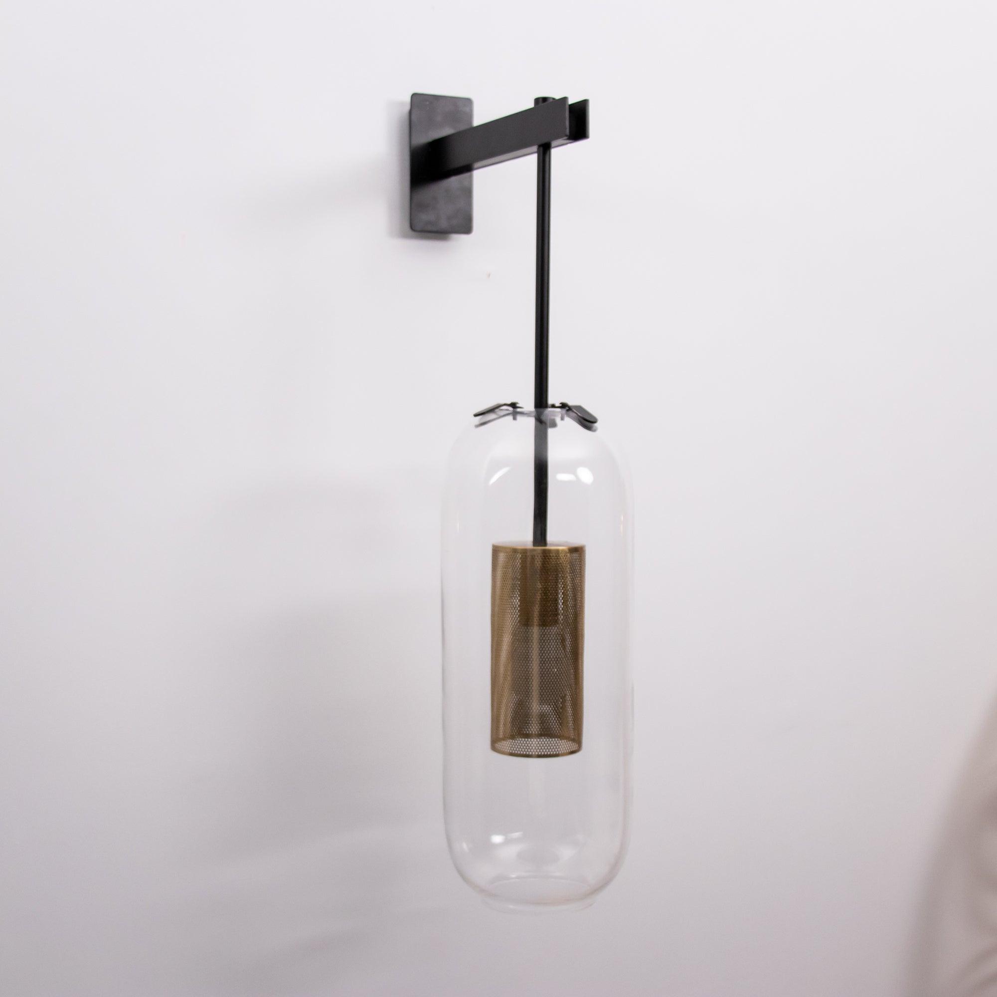 modern-cylinder-glass-wall-sconce-with-perforated-metal-cage-and-steel-accents-for-home-decor