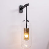 modern-cylinder-glass-wall-sconce-with-perforated-metal-cage-and-steel-accents-for-home-decor