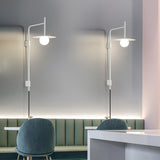 Modern Gea Swing Arm Wall Lamp with Frosted Glass Shade and Adjustable Iron Frame for Indoor Lighting