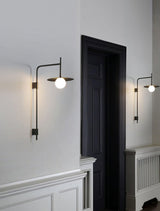 Modern Gea Swing Arm Wall Lamp with Frosted Glass Shade and Adjustable Iron Frame for Indoor Lighting