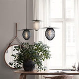 Modern Geometric Perforated Metal Satellite Pendant Lamp for Kitchen Island and Dining Areas