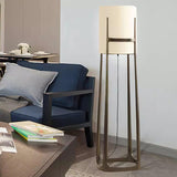 modern-geometric-standing-lamp-with-white-fabric-shade-in-brushed-bronze-finish