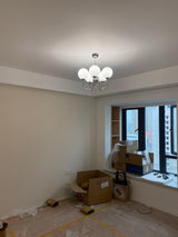 Modern Glass Globe Crown Chandelier with Elegant Chrome Curved Arms
