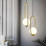 modern-glass-globe-pendant-light-minimalist-brass-sphere-hanging-lamp-for-dining-room