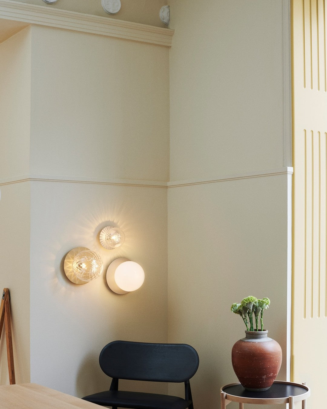 Modern Glass Globe Wall Sconce and Ceiling Lamp with Brass Metal Disc for Elegant Interior Decor