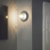 Modern Glass Globe Wall Sconce and Ceiling Lamp with Brass Metal Disc for Elegant Interior Decor