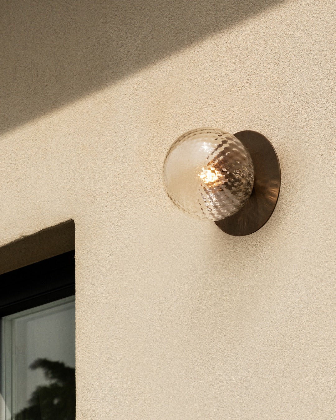 Modern Glass Globe Wall Sconce and Ceiling Lamp with Brass Metal Disc for Elegant Interior Decor