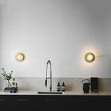 Modern Glass Globe Wall Sconce and Ceiling Lamp with Brass Metal Disc for Elegant Interior Decor