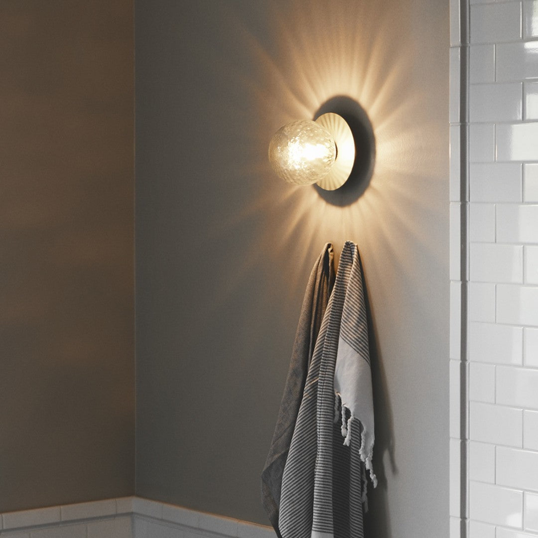 Modern Glass Globe Wall Sconce and Ceiling Lamp with Brass Metal Disc for Elegant Interior Decor