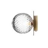 Modern Glass Globe Wall Sconce and Ceiling Lamp with Brass Metal Disc for Elegant Interior Decor