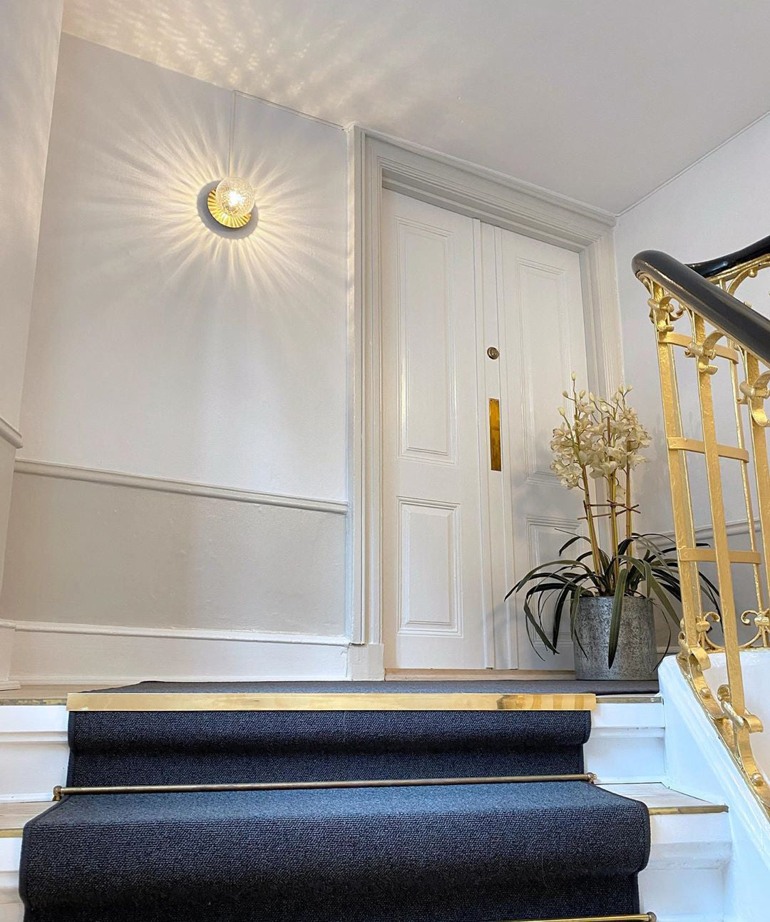 Modern Glass Globe Wall Sconce and Ceiling Lamp with Brass Metal Disc for Elegant Interior Decor