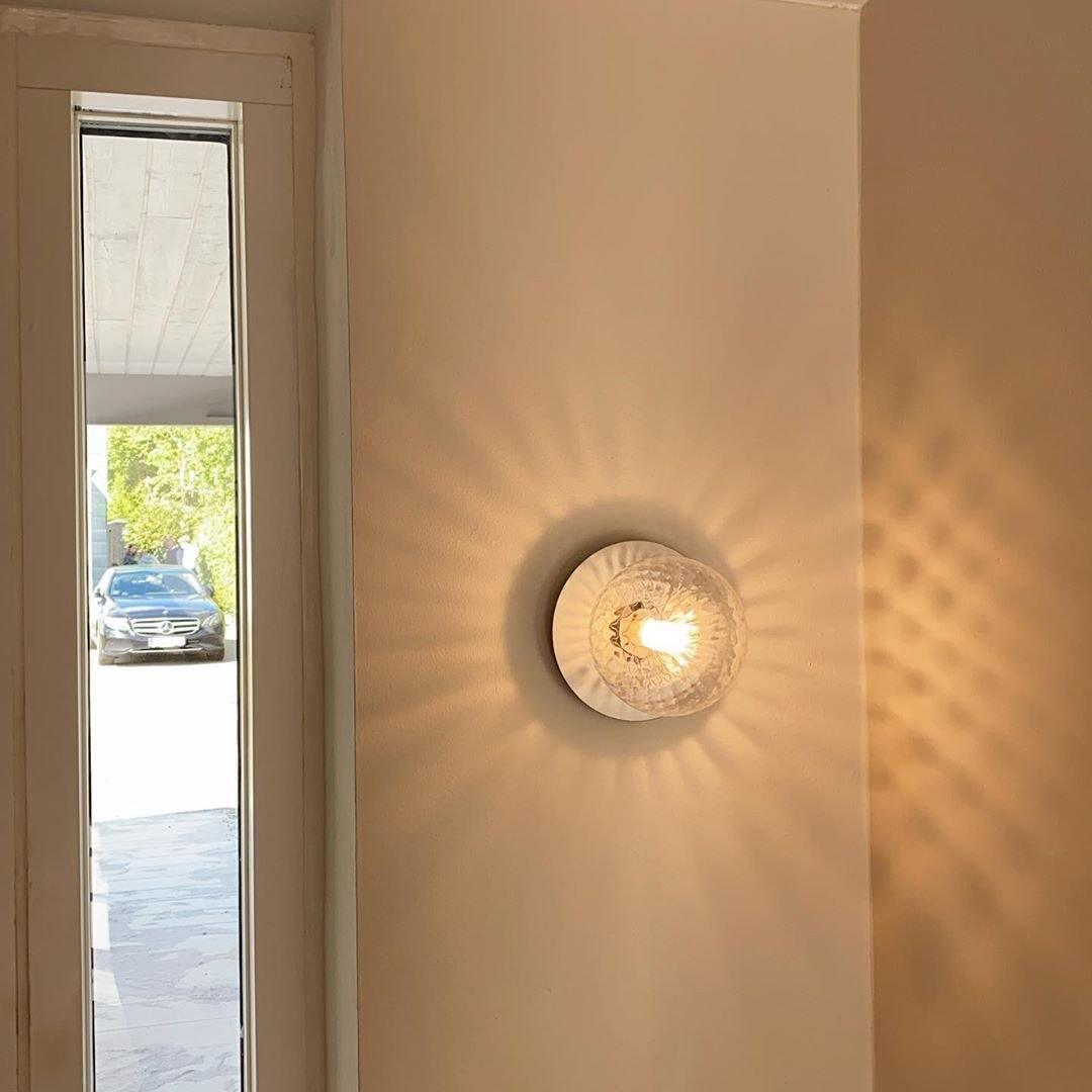 Modern Glass Globe Wall Sconce and Ceiling Lamp with Brass Metal Disc for Elegant Interior Decor