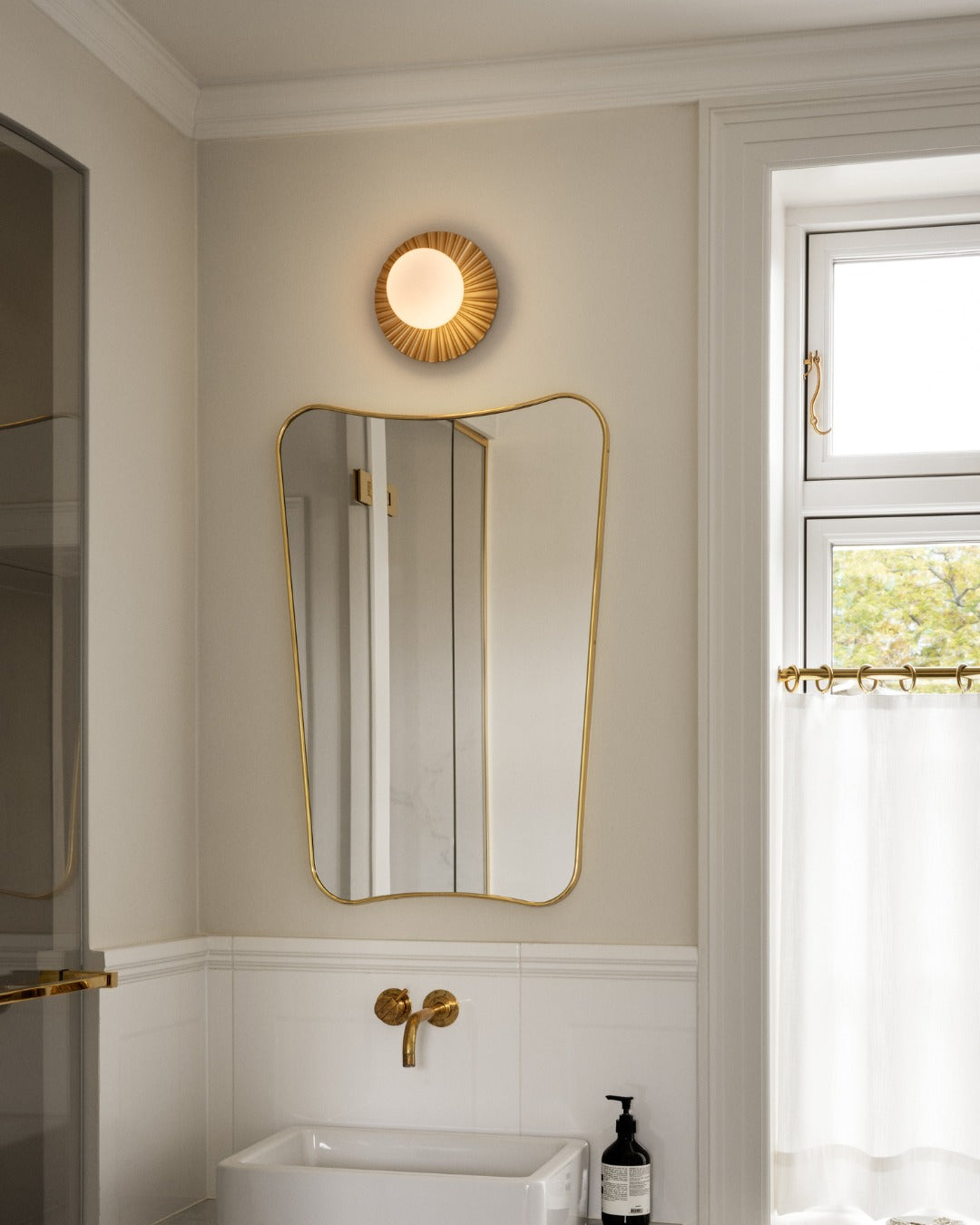 Modern Glass Globe Wall Sconce and Ceiling Lamp with Brass Metal Disc for Elegant Interior Decor