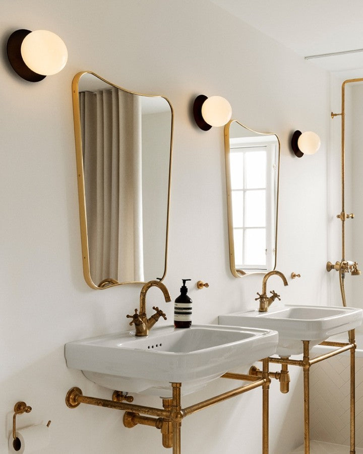 Modern Glass Globe Wall Sconce and Ceiling Lamp with Brass Metal Disc for Elegant Interior Decor
