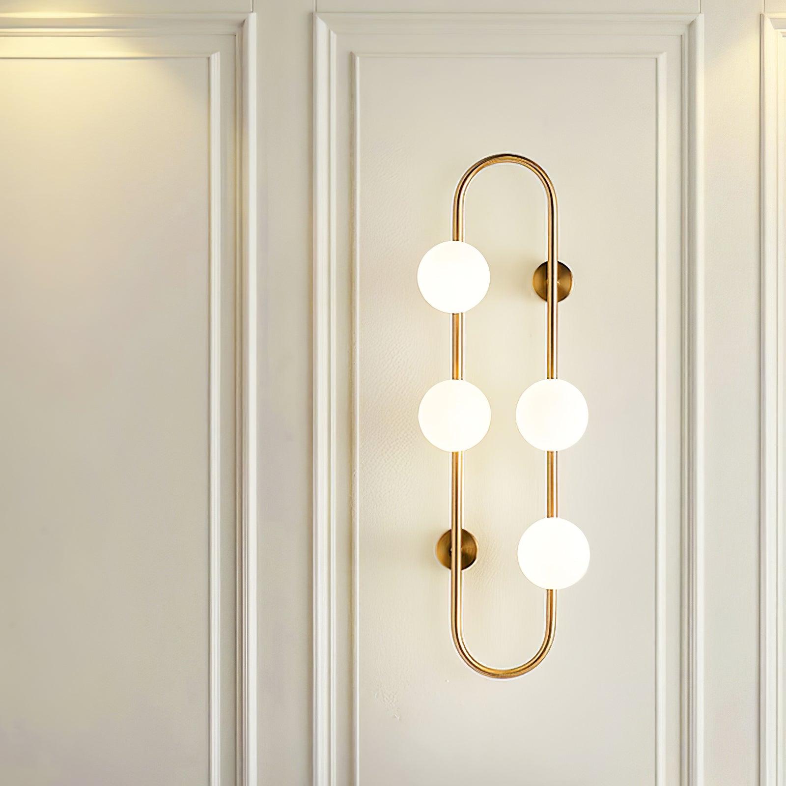 Modern Glass Globe Wall Sconce with Gold Metal Branch and Vertical Hanging Rod