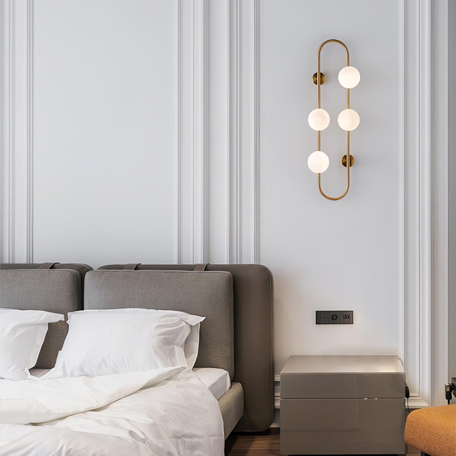Modern Glass Globe Wall Sconce with Gold Metal Branch and Vertical Hanging Rod