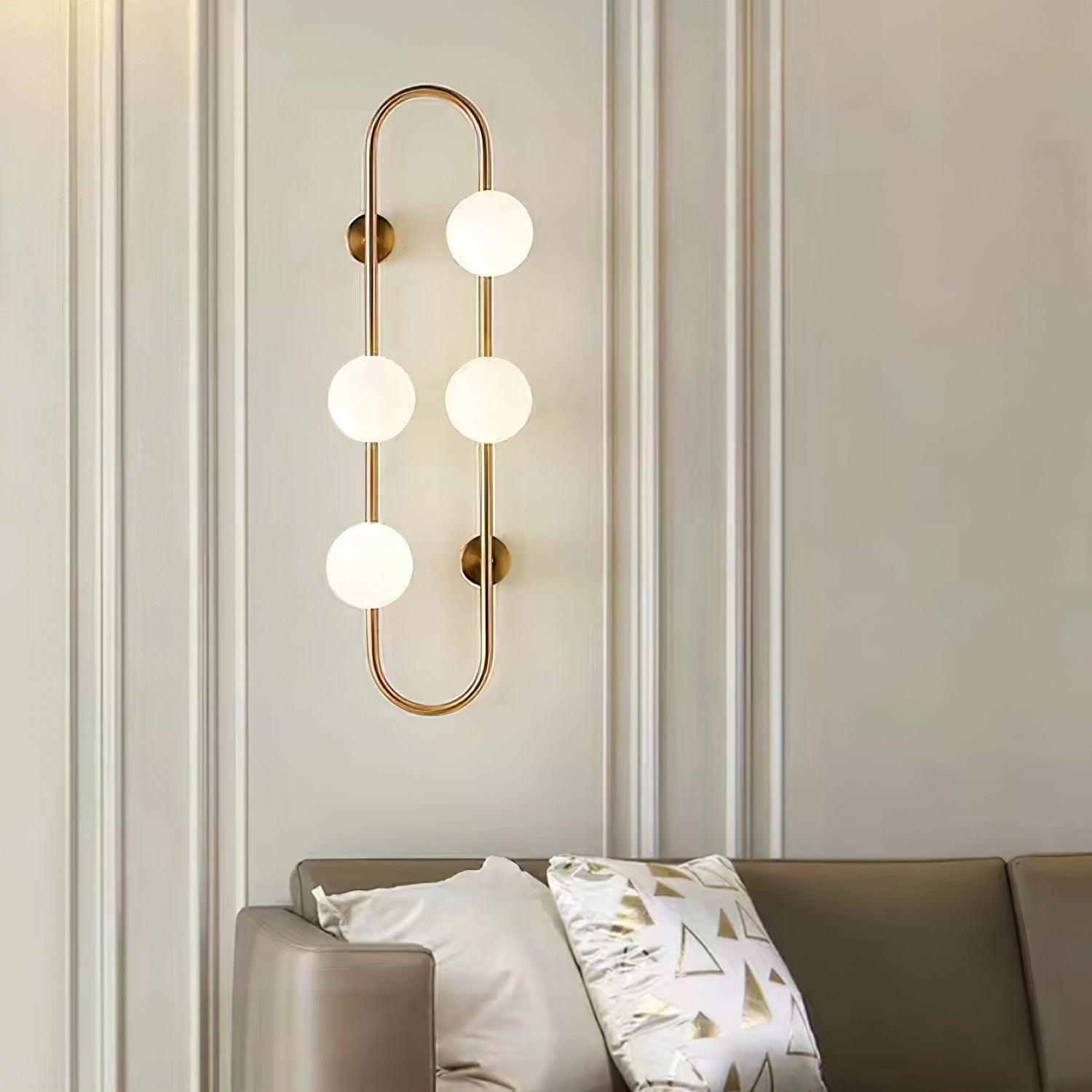 Modern Glass Globe Wall Sconce with Gold Metal Branch and Vertical Hanging Rod