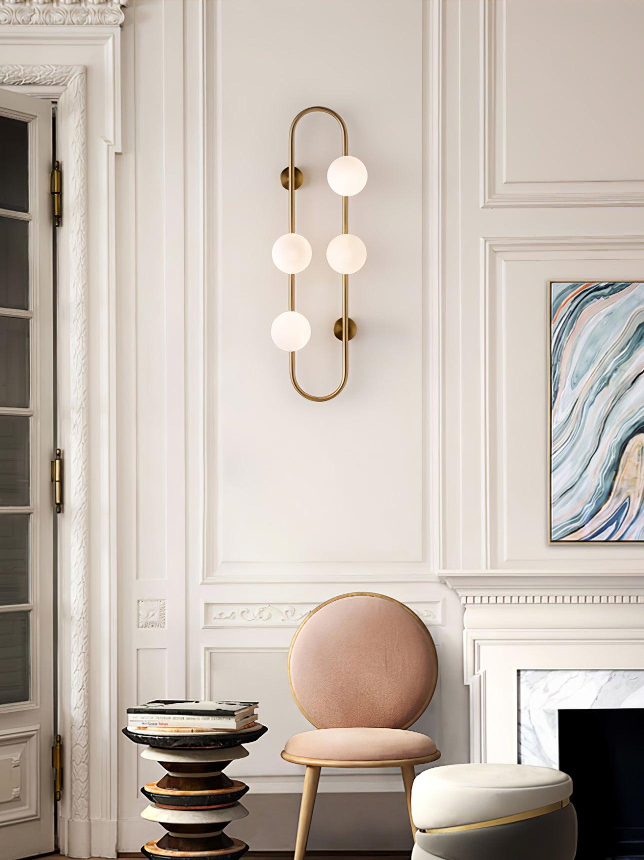 Modern Glass Globe Wall Sconce with Gold Metal Branch and Vertical Hanging Rod