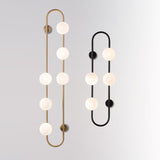Modern Glass Globe Wall Sconce with Gold Metal Branch and Vertical Hanging Rod