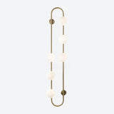 Modern Glass Globe Wall Sconce with Gold Metal Branch and Vertical Hanging Rod
