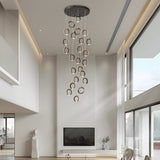Modern Gold and Black LED Ring Cluster Staircase Chandelier for High Ceilings and Foyers