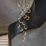 Modern Gold and Black LED Ring Cluster Staircase Chandelier for High Ceilings and Foyers