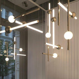 Modern Gold and White Glass Sphere Pendant Light with Linear Metal Frame LED