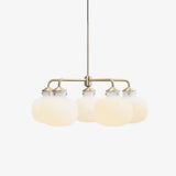 Modern Gold Metal and Opal Glass Globe Pendant Light for Contemporary Interiors