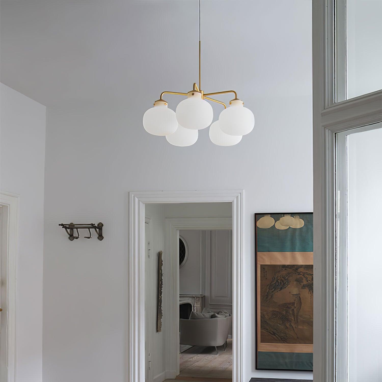 Modern Gold Metal and Opal Glass Globe Pendant Light for Contemporary Interiors