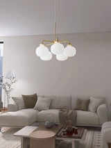 Modern Gold Metal and Opal Glass Globe Pendant Light for Contemporary Interiors