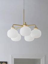 Modern Gold Metal and Opal Glass Globe Pendant Light for Contemporary Interiors
