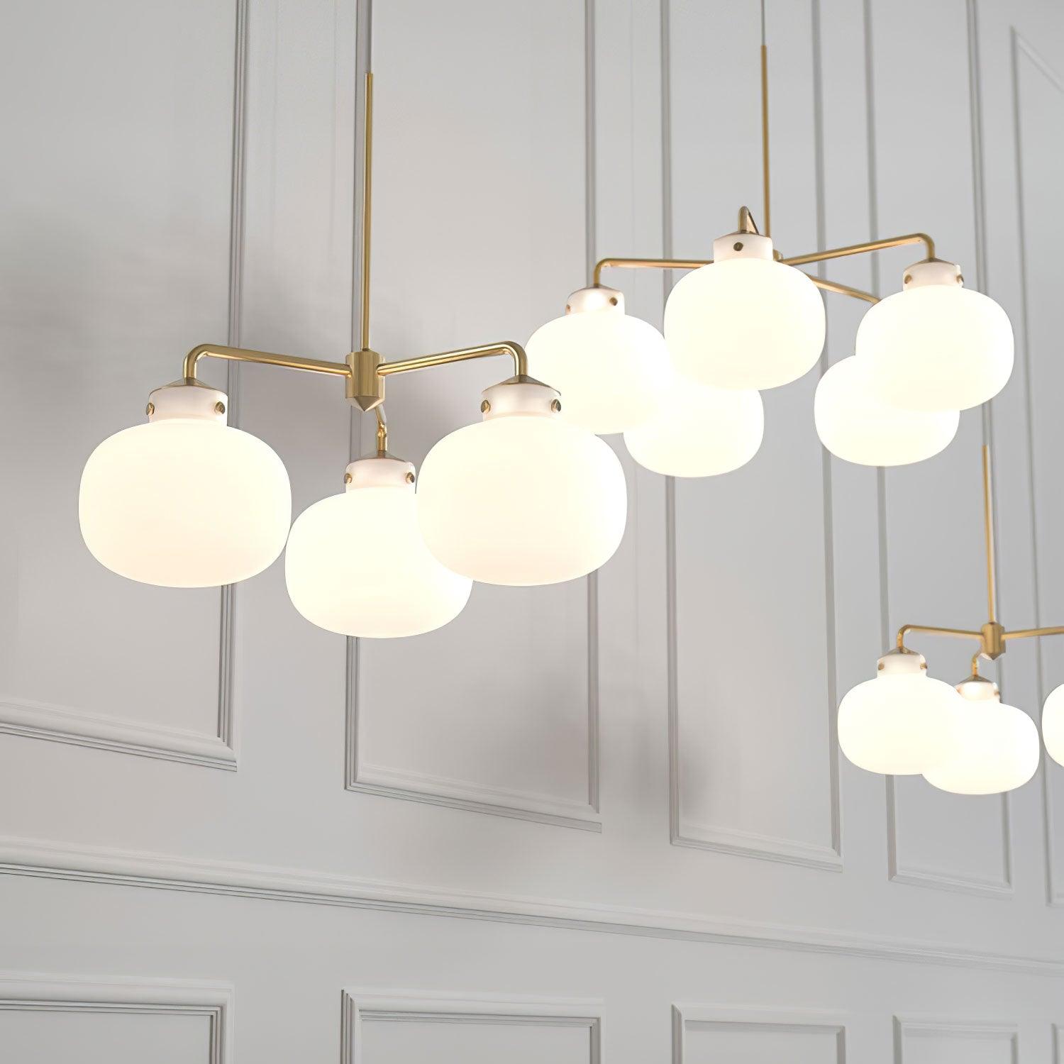 Modern Gold Metal and Opal Glass Globe Pendant Light for Contemporary Interiors