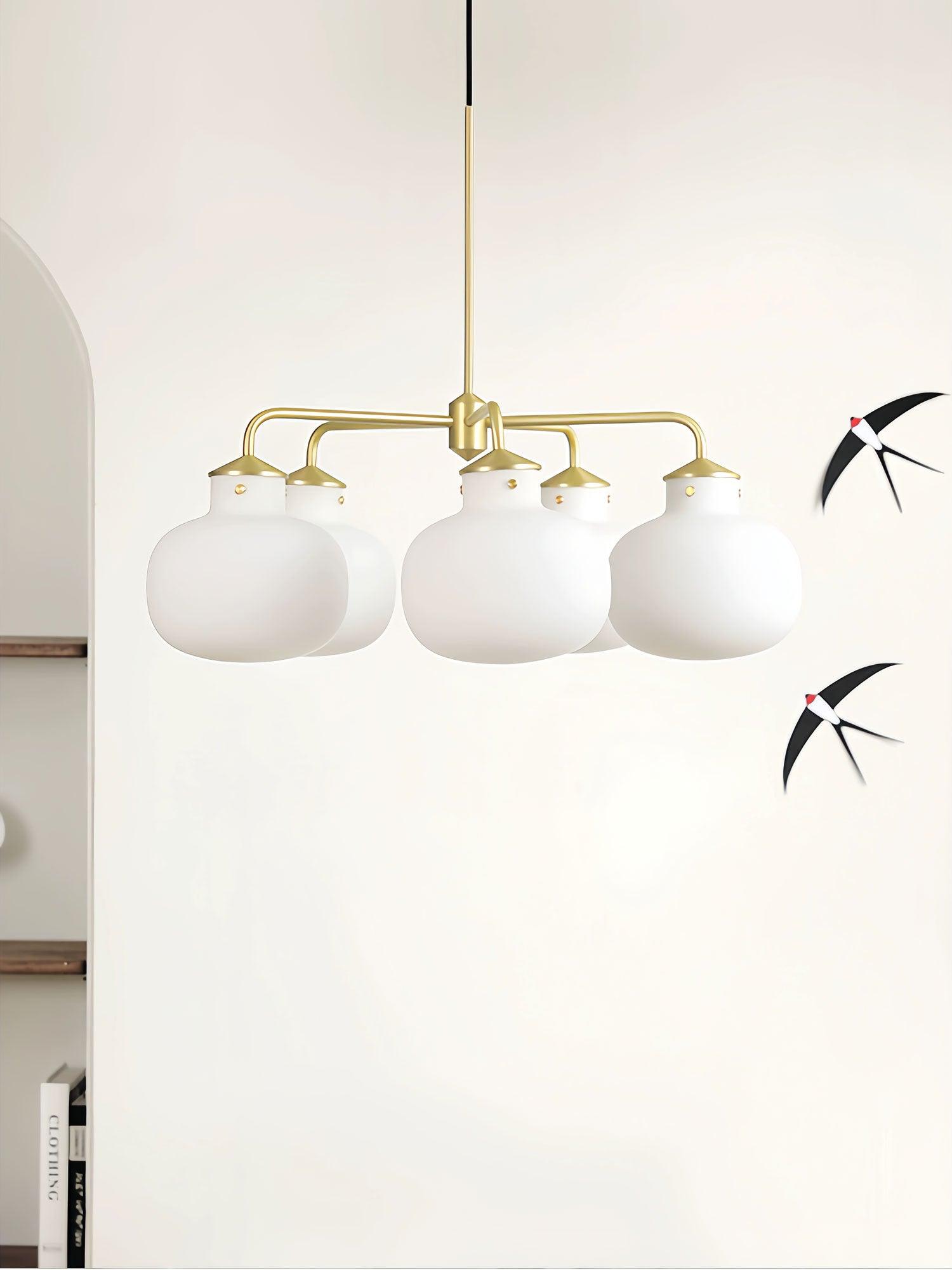 Modern Gold Metal and Opal Glass Globe Pendant Light for Contemporary Interiors