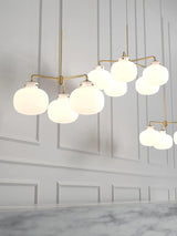Modern Gold Metal and Opal Glass Globe Pendant Light for Contemporary Interiors